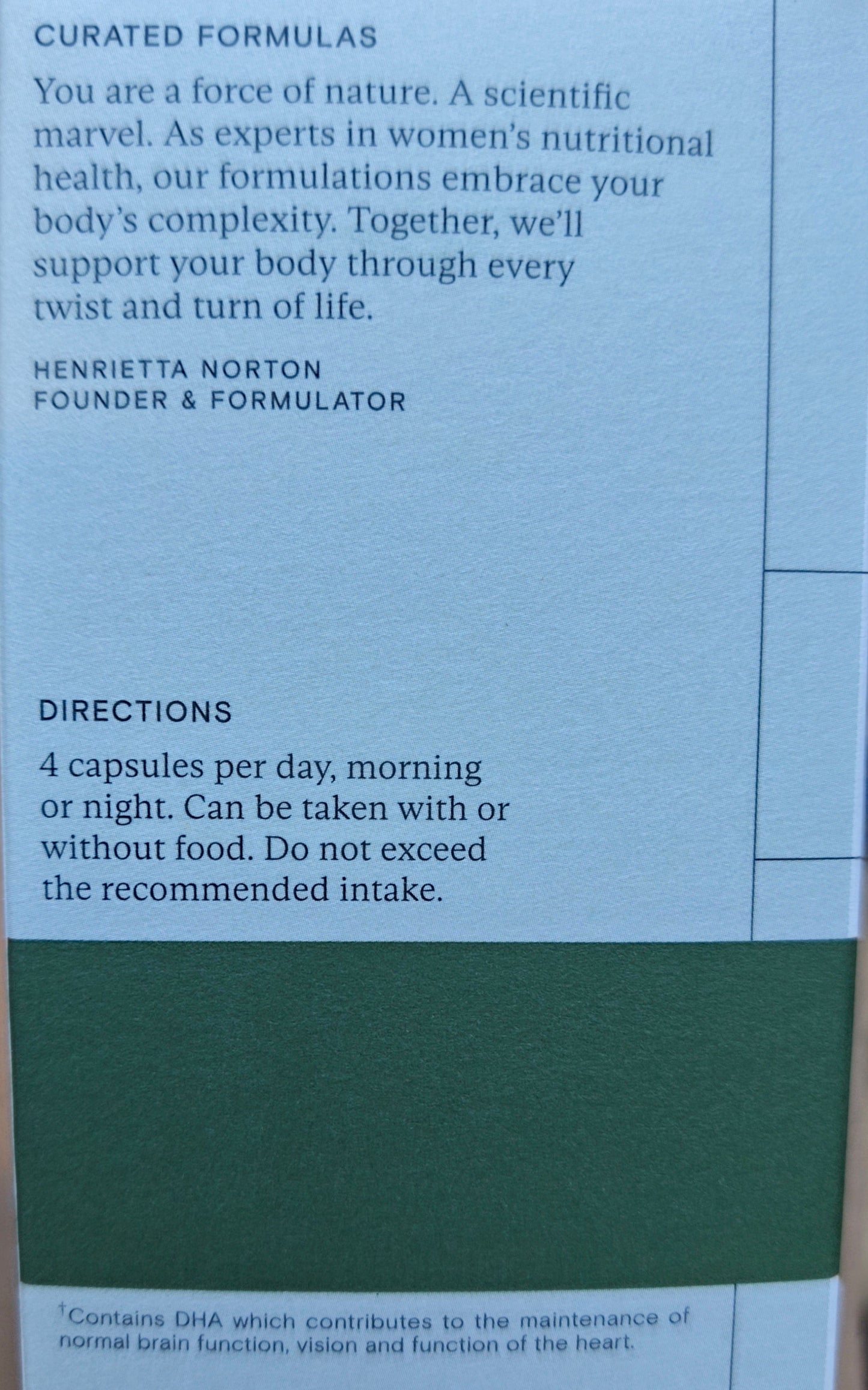 Product packaging with text on a wooden surface