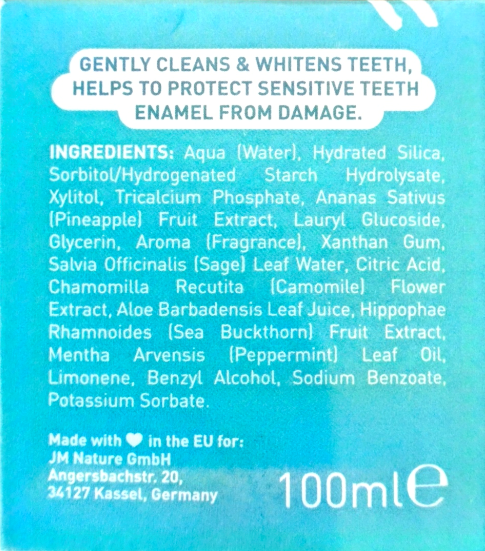 Blue product packaging label showing ingredients and text for a 100ml tooth whitening product, including 'Gently Cleans & Whitens Teeth, Helps to Protect Sensitive Teeth Enamel from Damage.'.