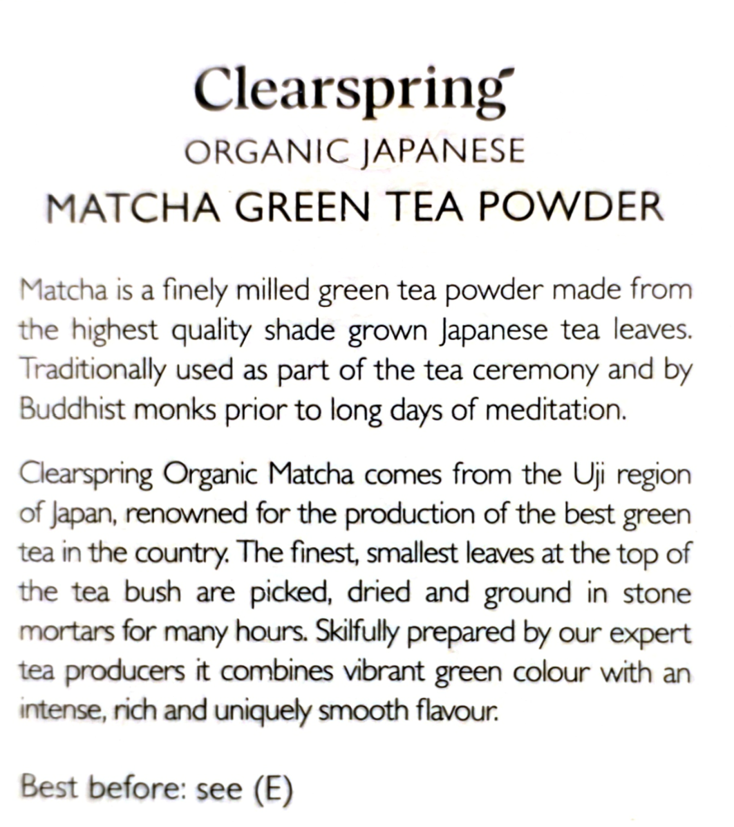 A close-up of a printed text panel for Clearspring Organic Japanese Matcha Green Tea Powder, featuring product description and benefits on a white background.