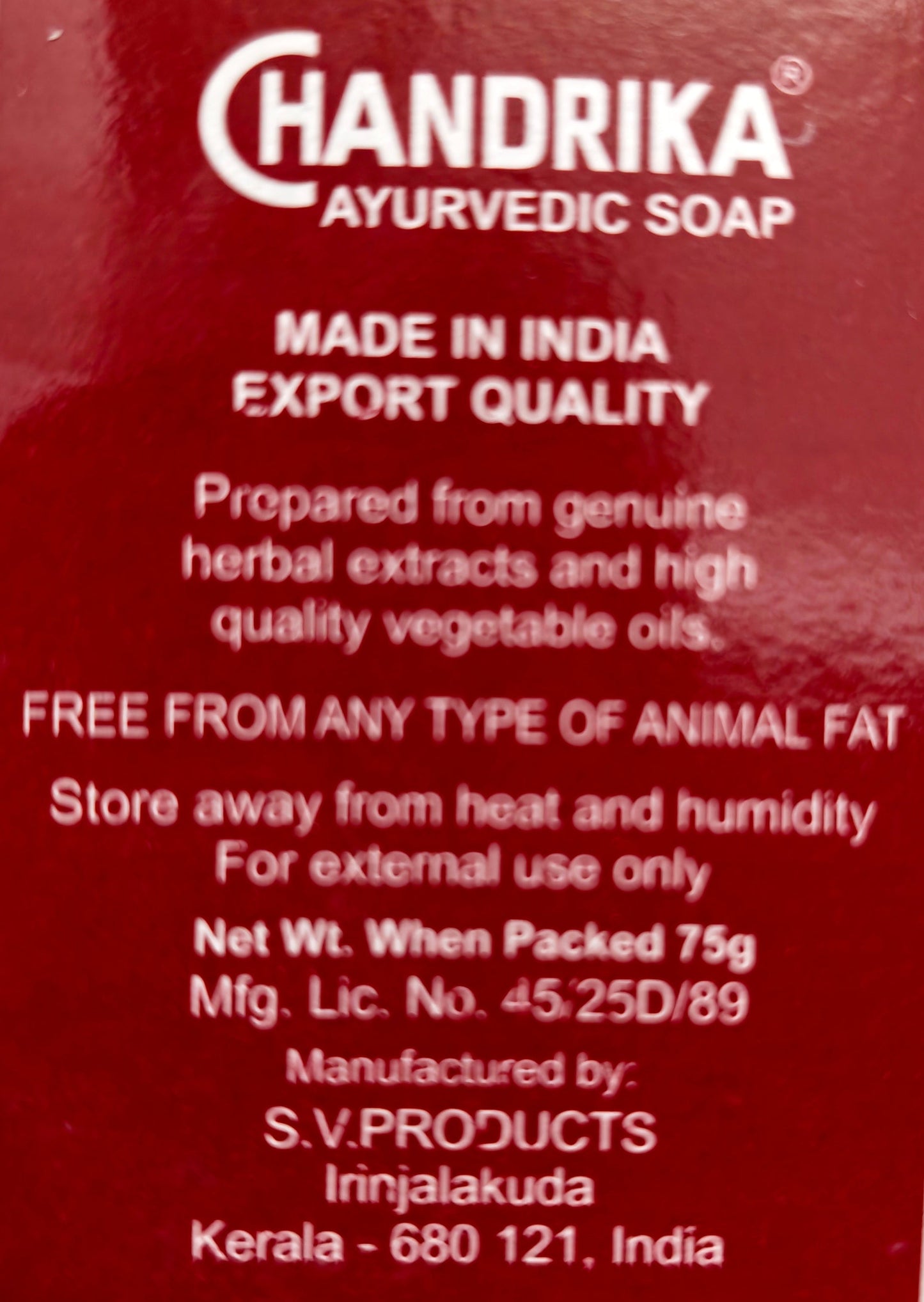Chandrika Ayurvedic Soap packaging with text on a blurred background