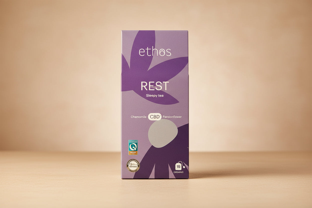 Box of ethos Rest Sleepy Tea with purple design and text on a white background