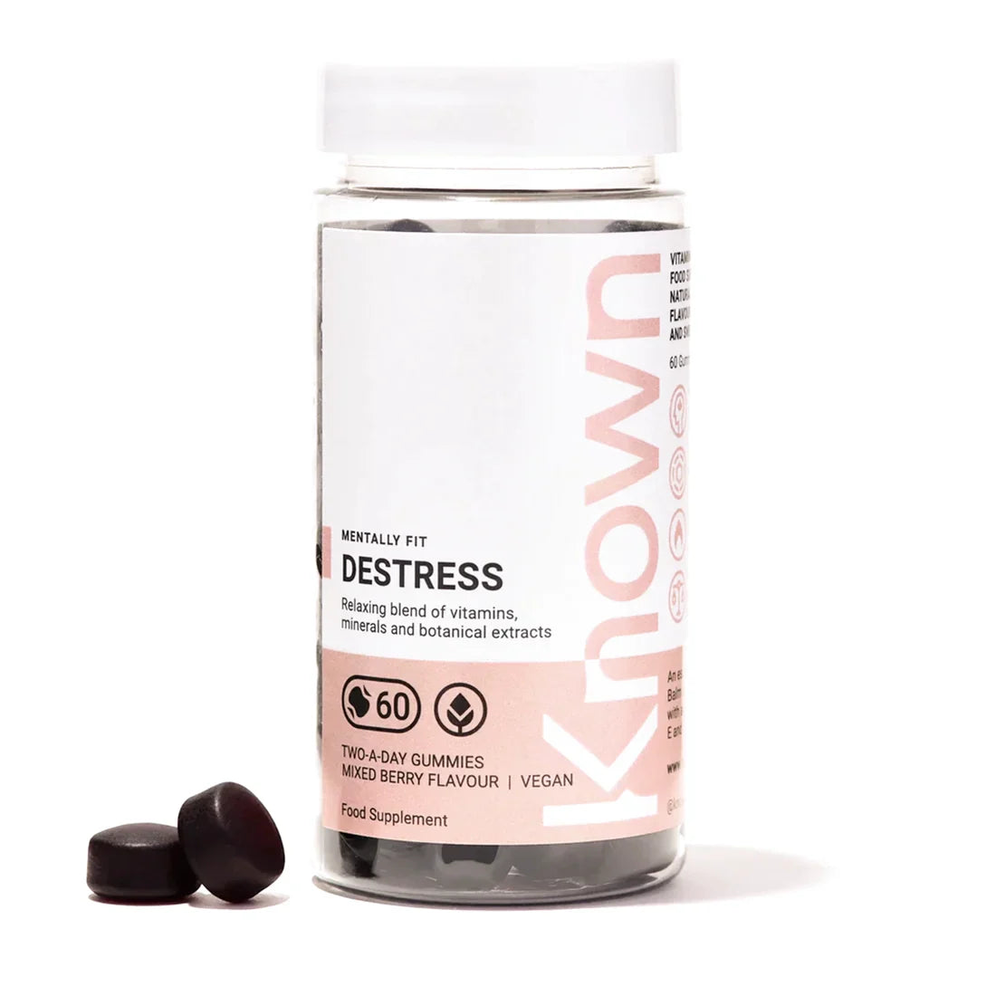 "Front view of Known Destress Gummies VEGAN, 60-count bottle with a couple of gummies around it."