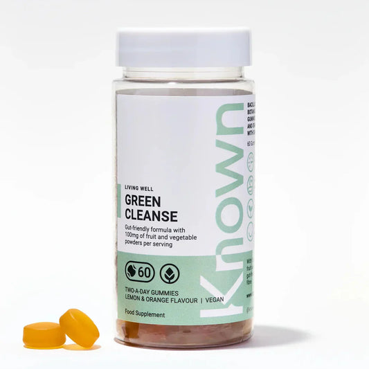 "Front view of Known Green Cleanse Gummies VEGAN, 60-count bottle with a couple of gummies around it."