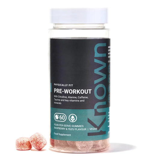 "Front view of Known Pre-Workout Gummies VEGAN, 60-count bottle with a couple of gummies around it."