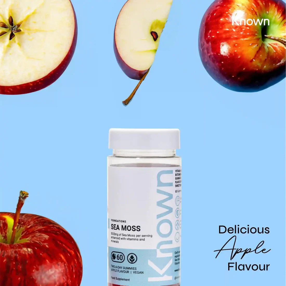 "Known Sea Moss Gummies VEGAN bottle surrounded by fresh apples, emphasizing the delicious natural apple flavor."
