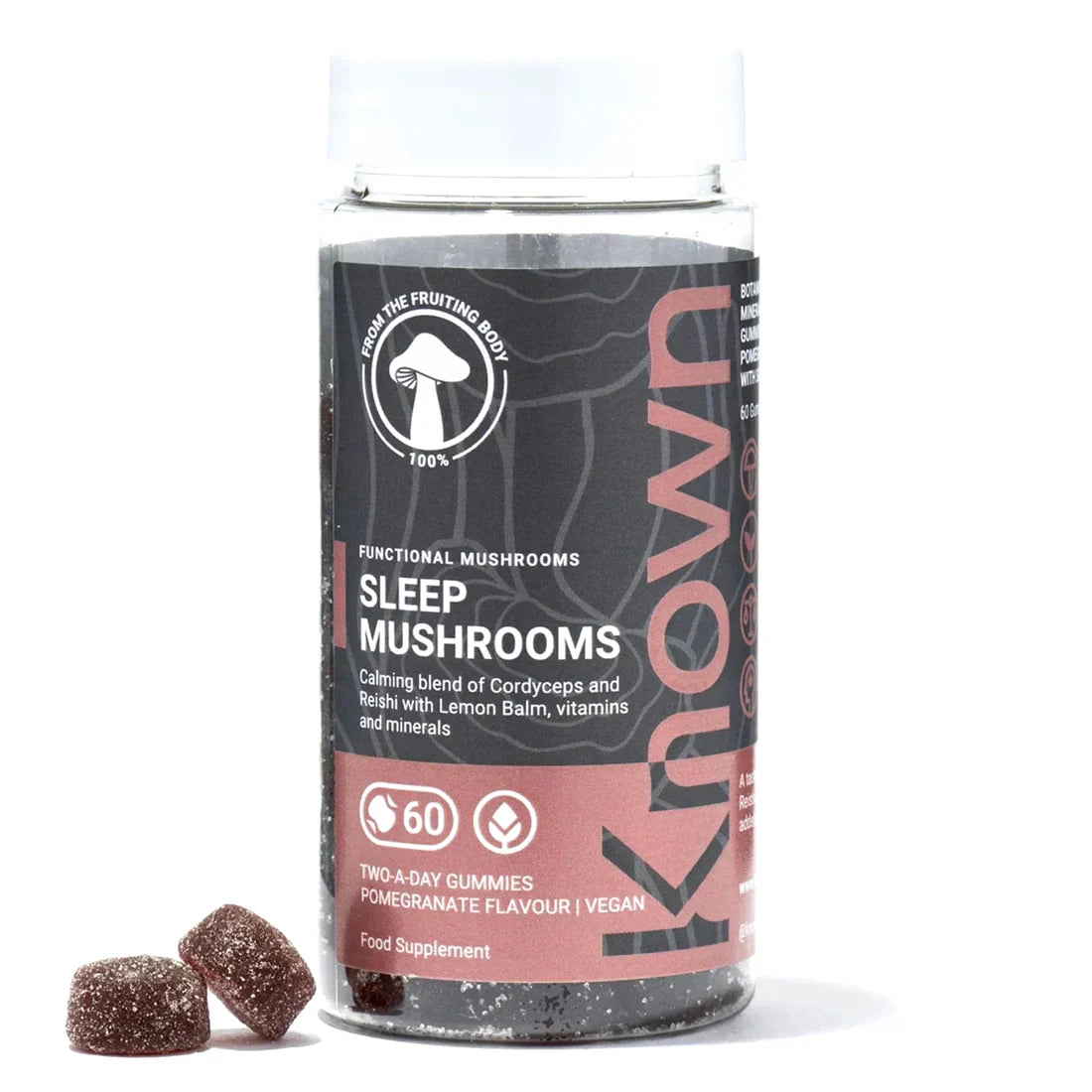 "Front view of Known Sleep Mushrooms Gummies VEGAN, 60-count bottle with a couple of gummies around it."