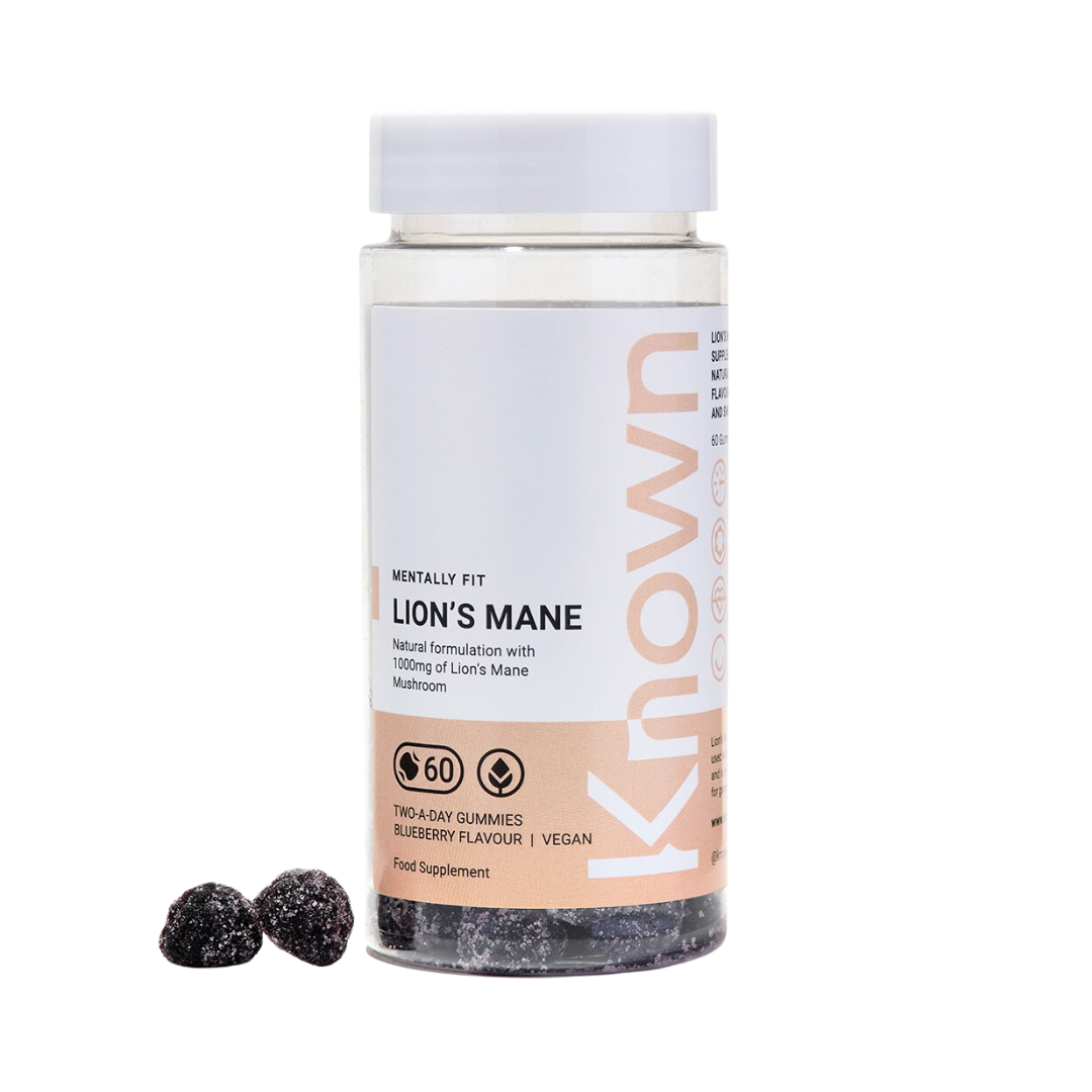 Front view of Known Lion’s Mane Gummies VEGAN, 60-count bottle with a couple of gummies around it.