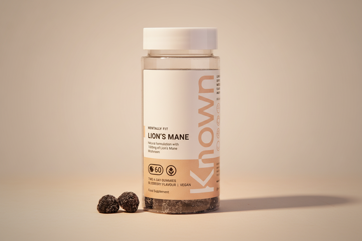 Front view of Known Lion’s Mane Gummies VEGAN, 60-count bottle with a couple of gummies around it.