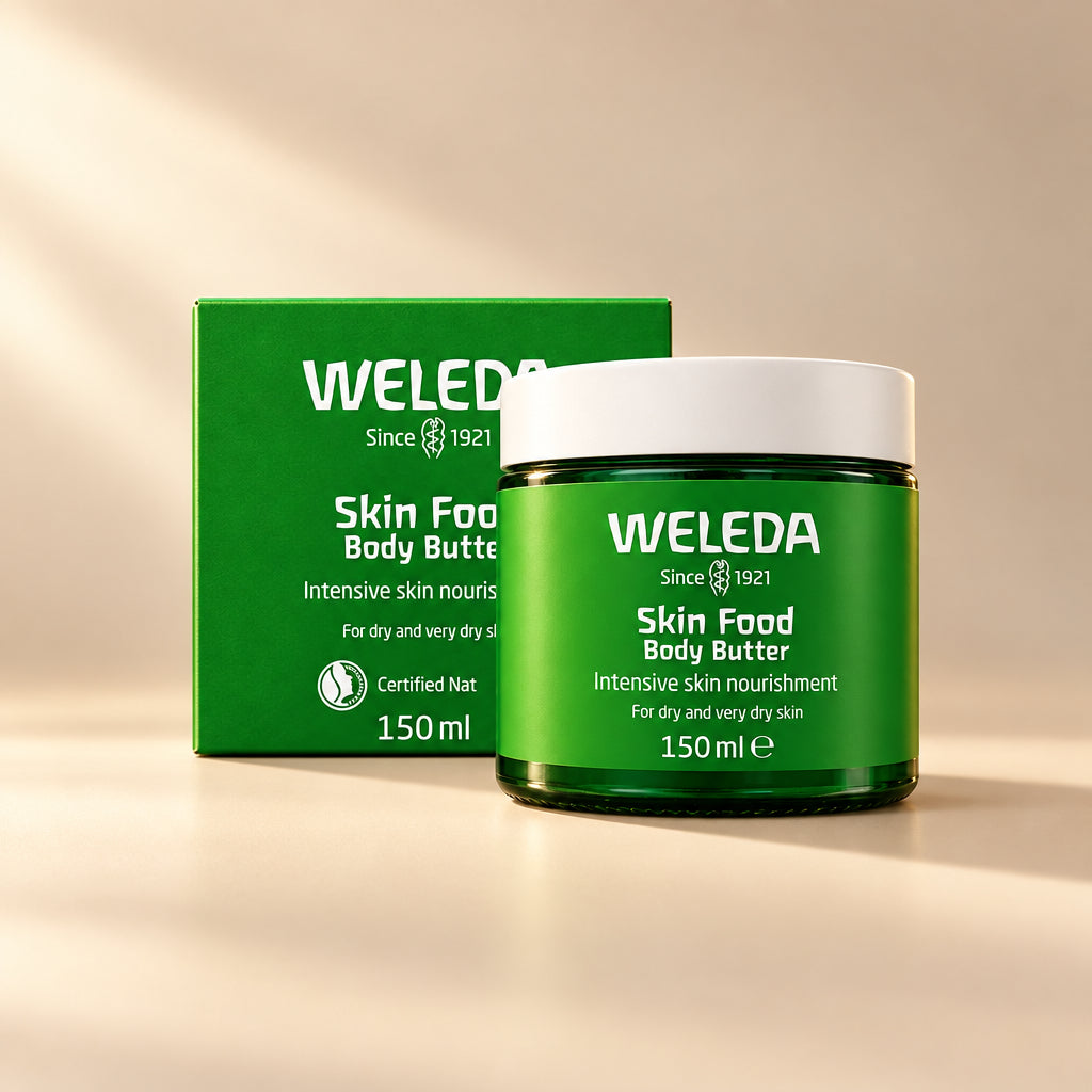 Weleda Skin Food Body Butter 150ml in eco-friendly glass jar with whipped texture.