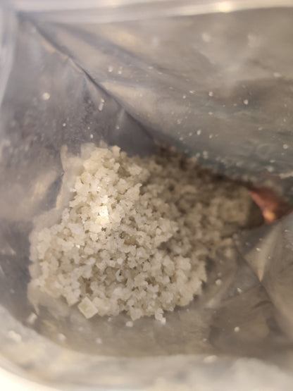 Close-up of Sel de Guérande salt crystals inside the pouch
