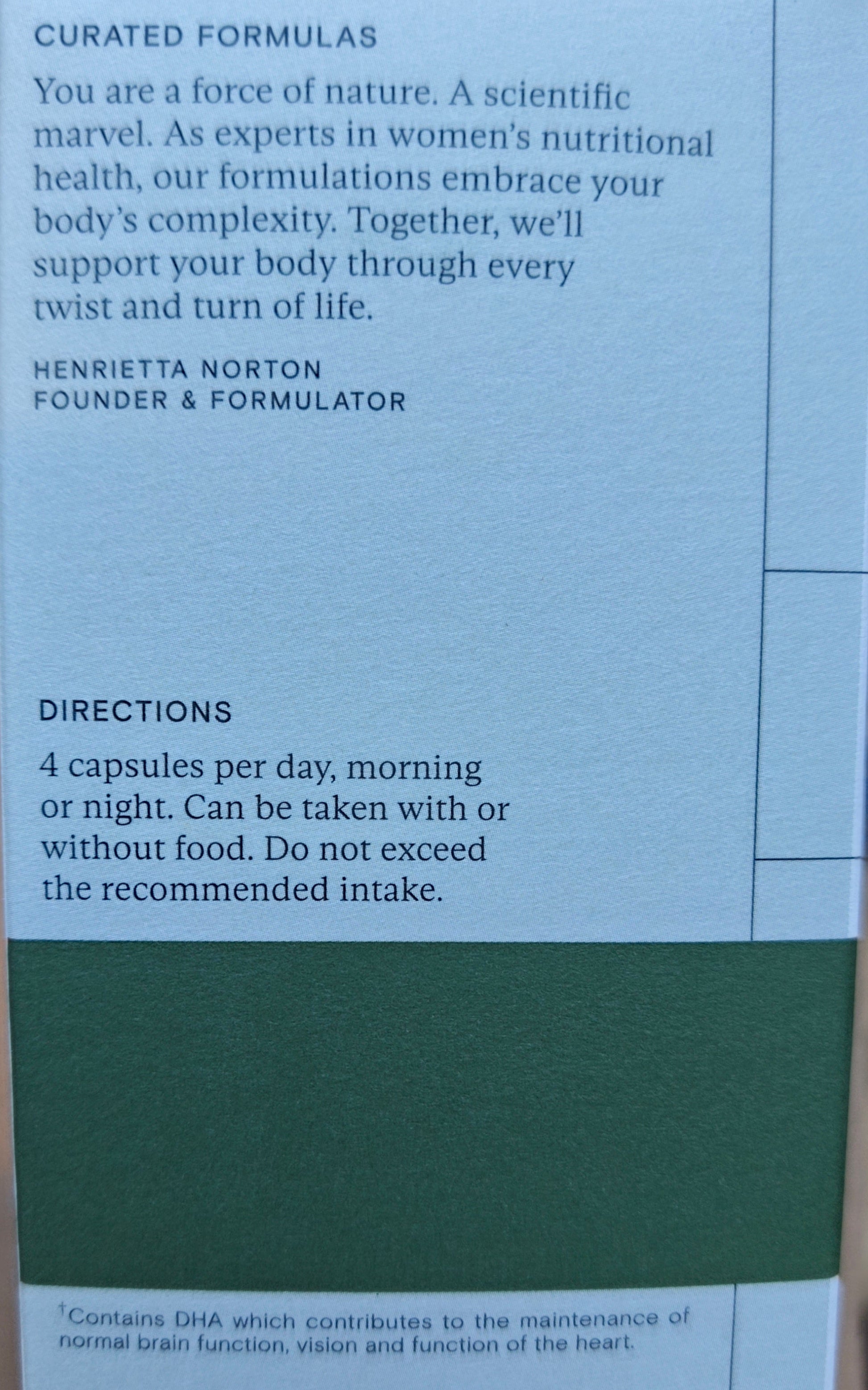 Product packaging with text on a wooden surface