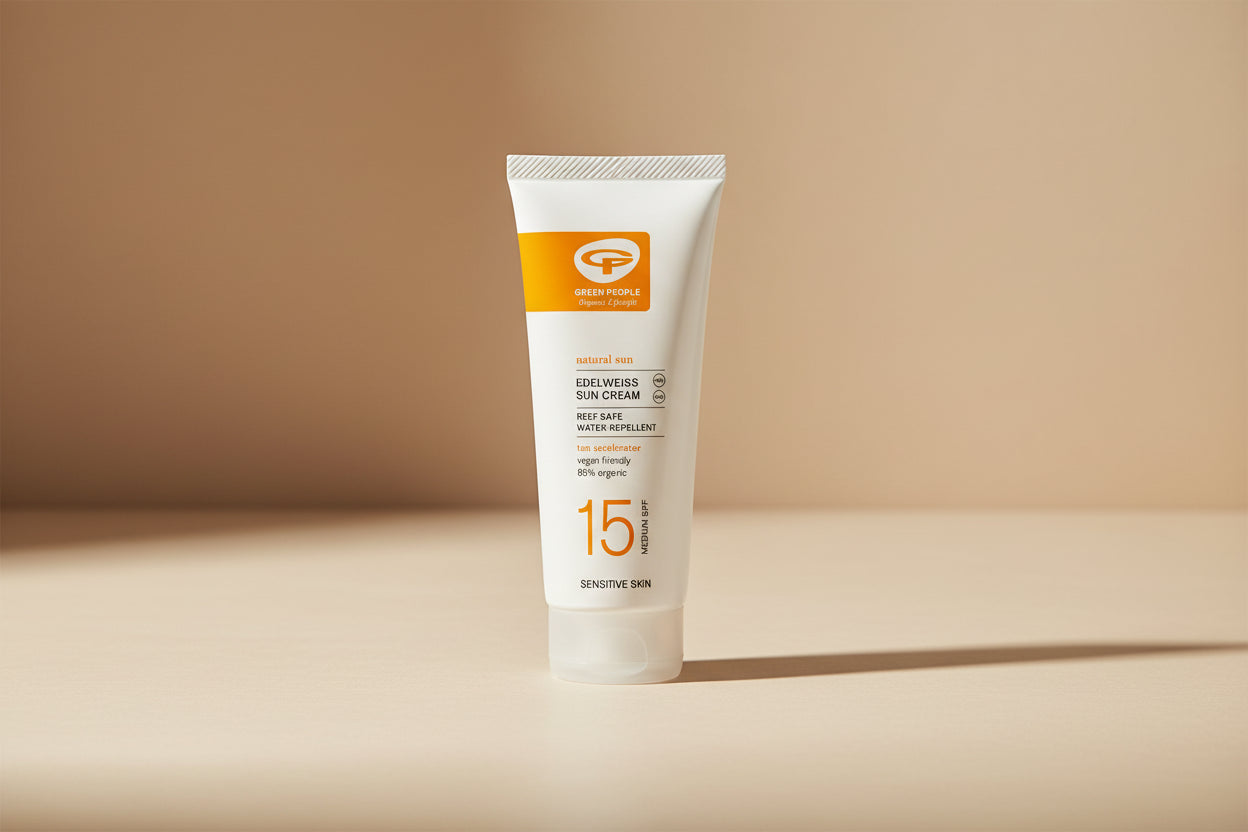 Sun cream tube with SPF 15 on a white background