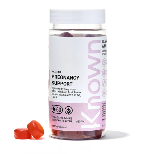 "Known Pregnancy Support Gummies VEGAN in a 410g resealable bottle, showcasing the raspberry flavor and vibrant packaging."