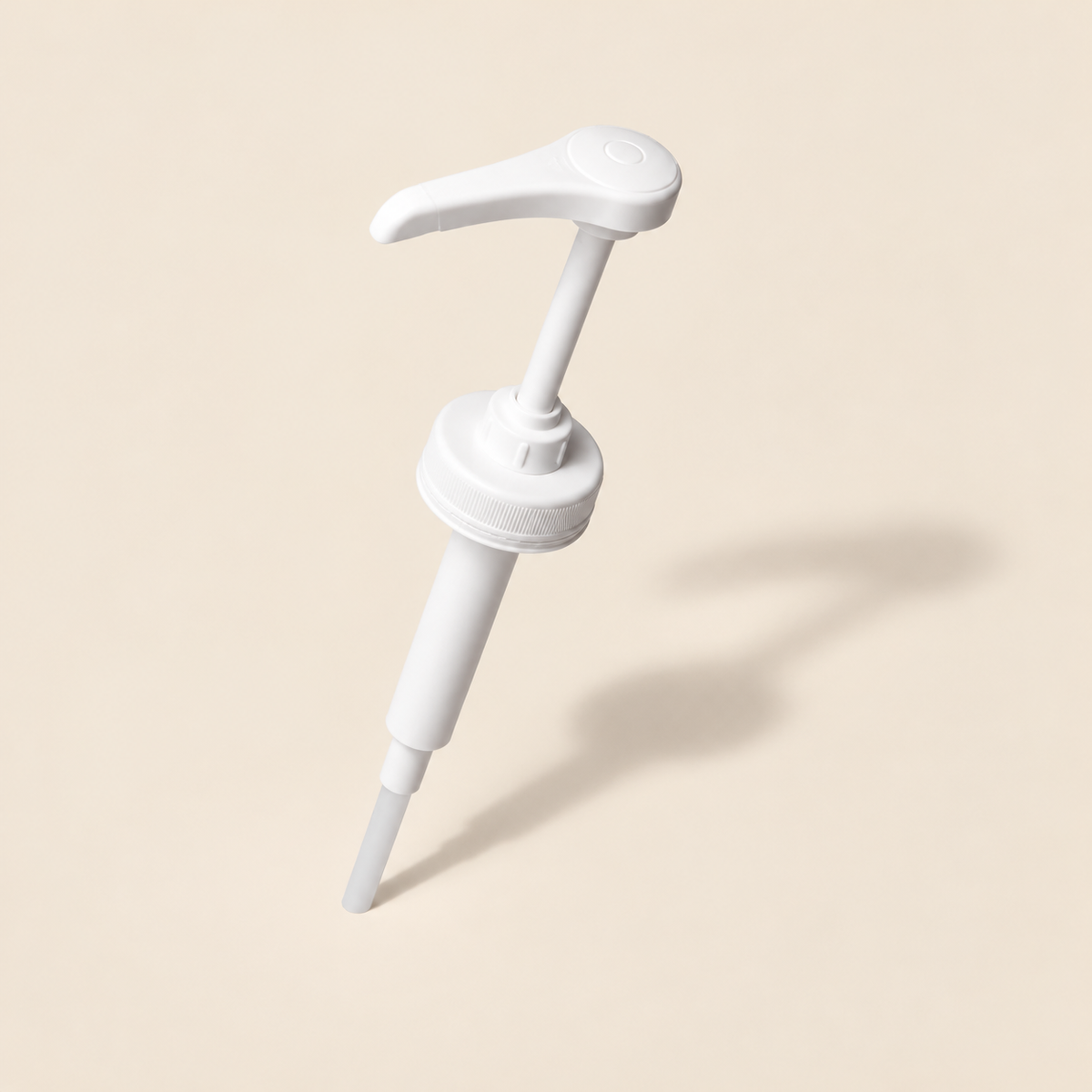 Active Edge CherryActive dispenser pump for a 946ml bottle on a warm beige background
