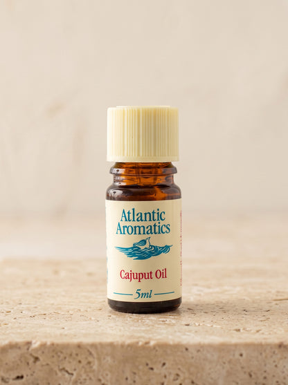 Atlantic Aromatics Cajuput Essential Oil – 5ml front bottle label on warm beige background