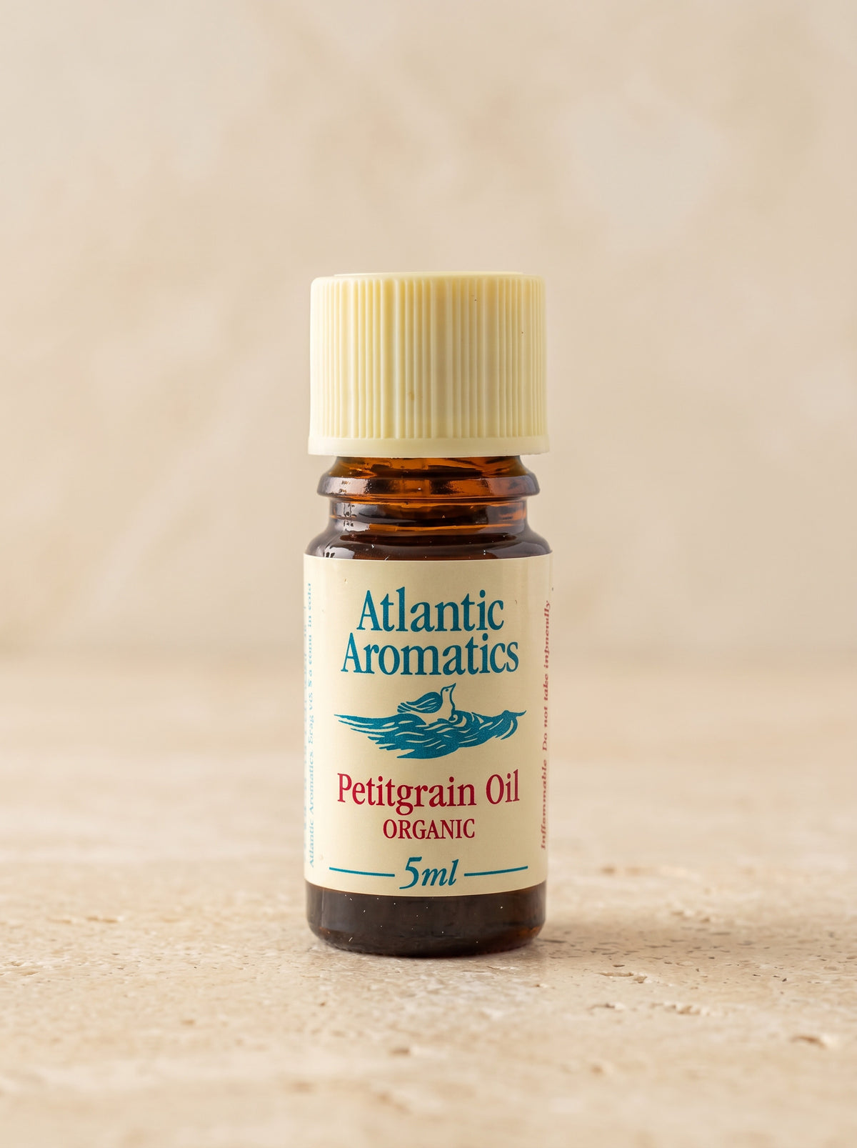 Atlantic Aromatics Organic Petitgrain Essential Oil – 5ml front bottle on warm beige background