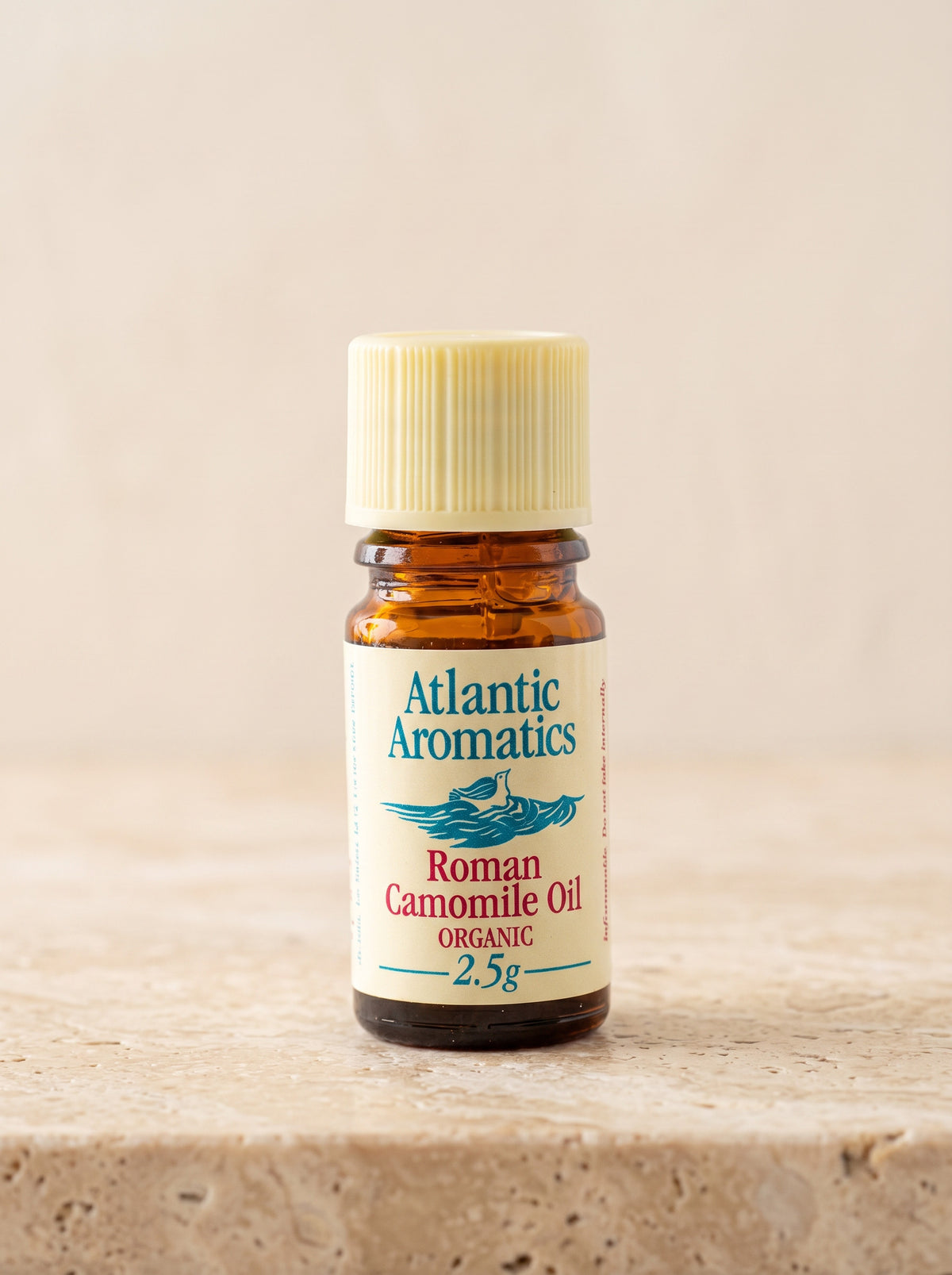 Atlantic Aromatics Roman Camomile Organic Essential Oil – 2.5g front bottle on warm beige background