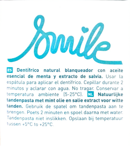 A white rectangular label with blue text and a large stylized 'Smile' logo at the top, showing product information in Spanish and Dutch.