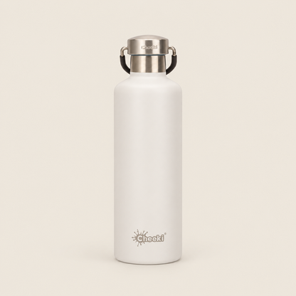 Cheeki Classic Insulated Water Bottle – White 600ml on a warm beige background