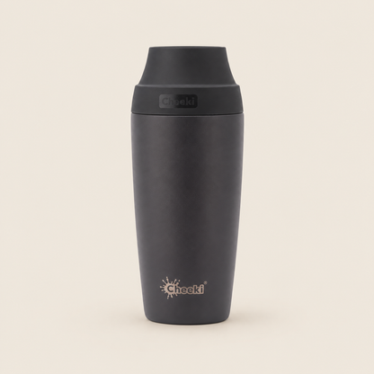 Cheeki Insulated Coffee Mug – Chocolate 450ml on a warm beige background