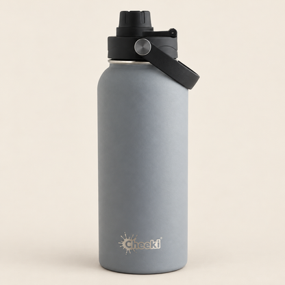 Cheeki Adventure Insulated Water Bottle – Slate 600ml on a warm beige background
