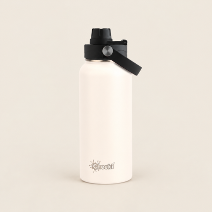 Cheeki Adventure Insulated Water Bottle – White 1L on a warm beige background