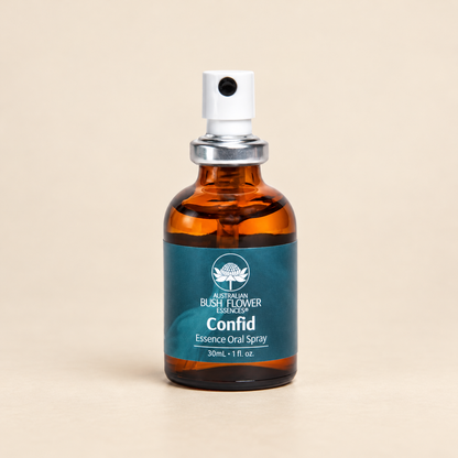 Australian Bush Flower confid oral spray on a warm beige background