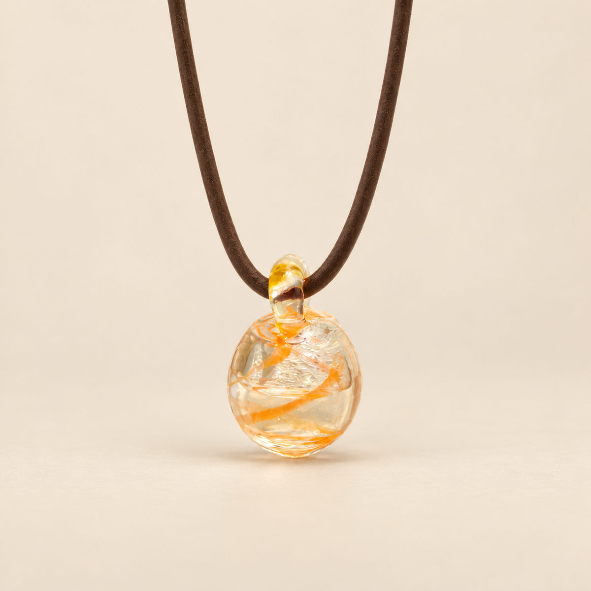 Australian Bush Flower confid pendant on a warm beige background