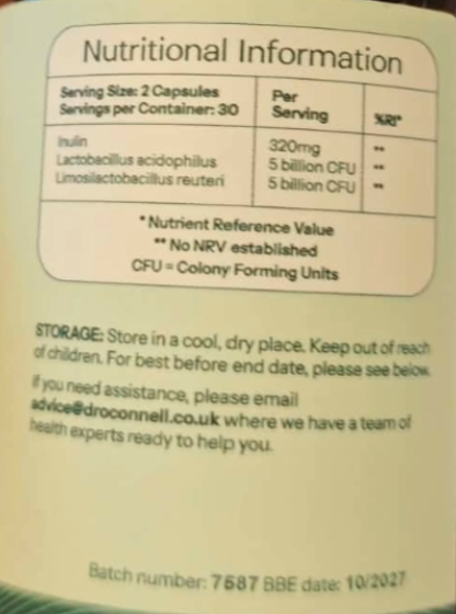 Close-up of a product label showing the 'Nutritional Information' panel with text for inulin, Lactobacillus acidophilus, and Limosilactobacillus reuteri, along with storage instructions and contact details.
