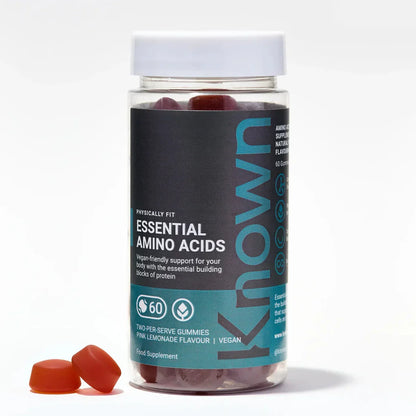  "Front view of Known Essential Amino Acids Gummies VEGAN Halal Certified, 60-count bottle with a couple of gummies around it."