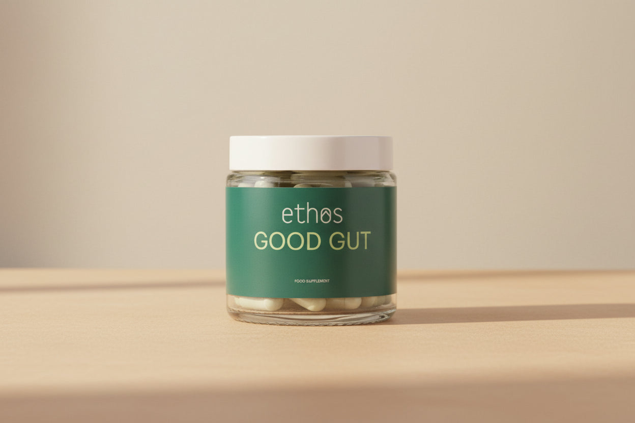 Jar of 'Good Gut' supplements with 'ethos' branding on a white background