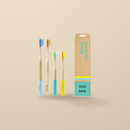 FETE Fantastic Family Bamboo Toothbrushes – 4 Pack — original product packaging on warm beige background