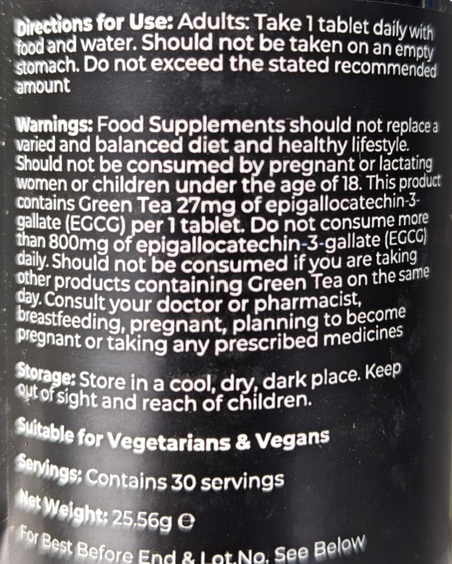 Supplement label with directions and warnings on a black background