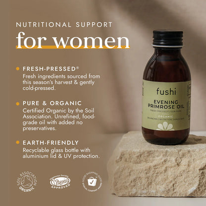 Fushi Evening Primrose Oil next to salad and skincare items