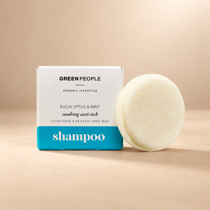 Green People Eucalyptus & Mint Shampoo Bar – Soap-Free, 50g in its original packaging on a warm beige background