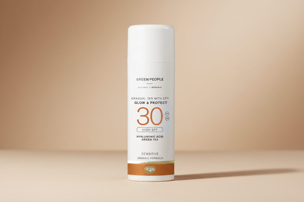 Green People sunscreen bottle with SPF 30 on a white background