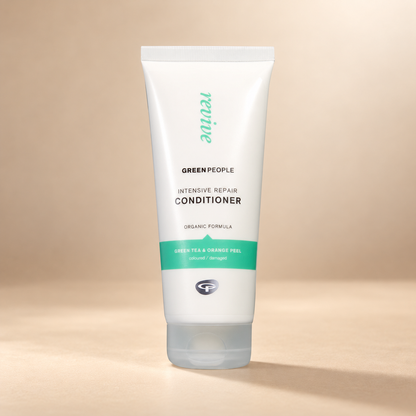 Green People Intensive Repair Conditioner – Green Tea & Avocado, 200ml in its original packaging on a warm beige background