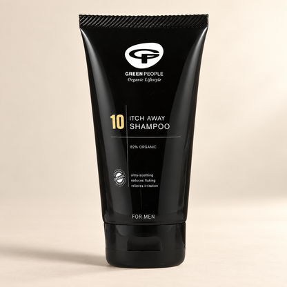 Green People No.10 Itch Away Shampoo 125ml – original black tube on a warm cream background