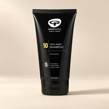Green People No.10 Itch Away Shampoo 125ml – original black tube on a warm cream background