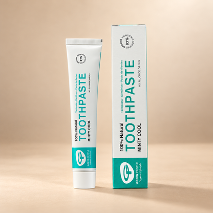 Green People Minty Cool Toothpaste – Peppermint & Spearmint, 50ml in its original packaging on a warm beige background