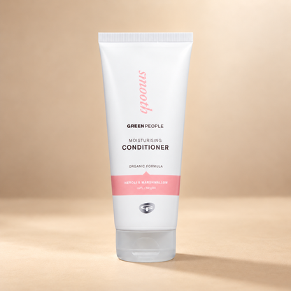 Green People Moisturising Conditioner – Neroli & Marshmallow, 200ml in its original packaging on a warm beige background