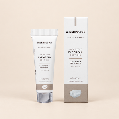 Green People Scent Free Eye Cream – Tuberose & Prebiotics, 10ml in original packaging on a warm beige background