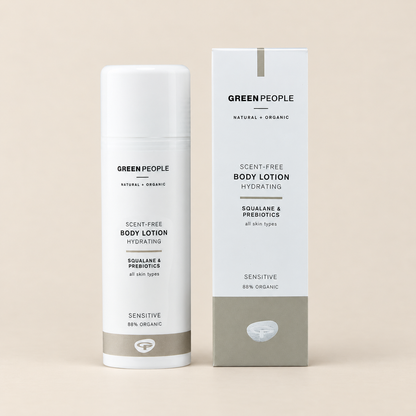 Green People Scent Free Hand & Body Lotion – Squalane & Prebiotics, 150ml in original packaging on a warm beige background