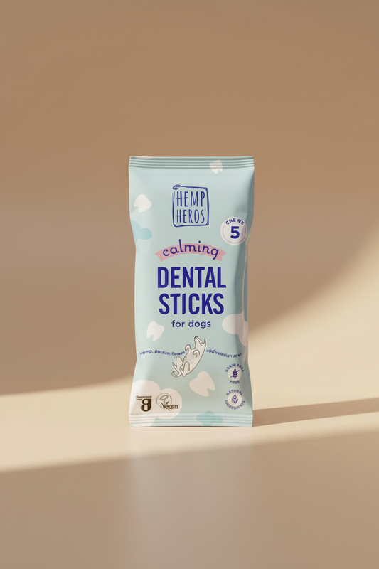 A package of Hemp Heros Calming Dental Sticks for dogs, featuring a light blue bag with white clouds and purple text.