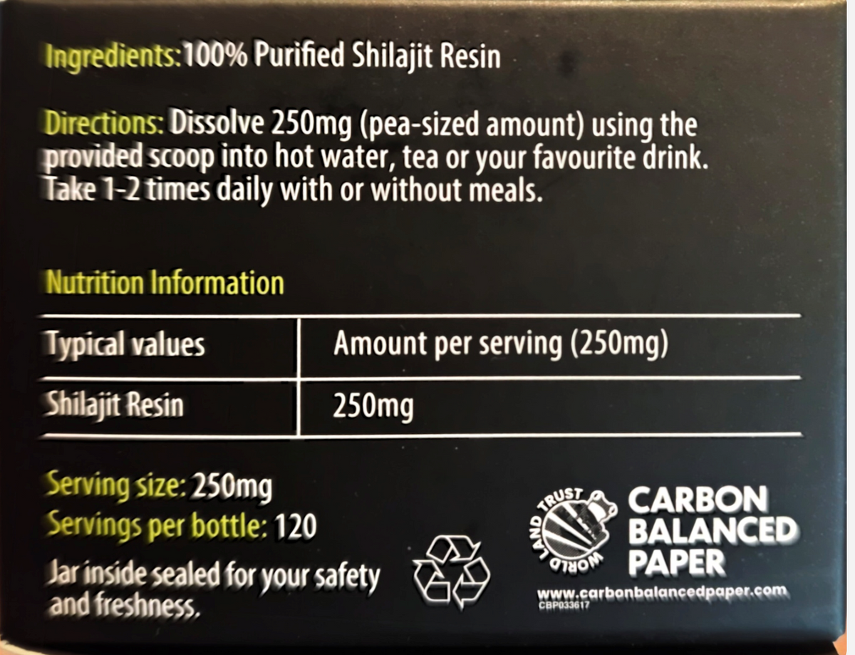 Close-up of the back of a black product box showing ingredients, directions, nutrition information, serving size, and a Carbon Balanced Paper logo.