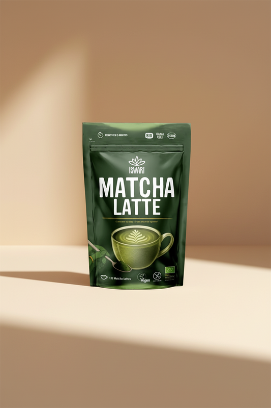 A green stand-up pouch of ISWARI Matcha Latte, featuring a graphic of a green matcha latte cup with leaf art on the front, set against a plain white background.