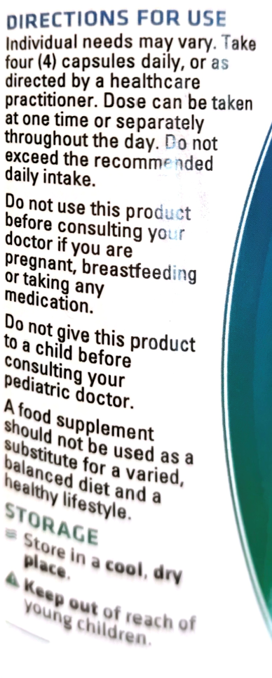 Close-up of a product label showing directions for use, dosage instructions, storage, and warnings in black text on a white background with a blue curved accent.