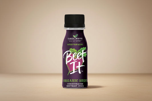 Bottle of 'Beet It' organic shot on a white background
