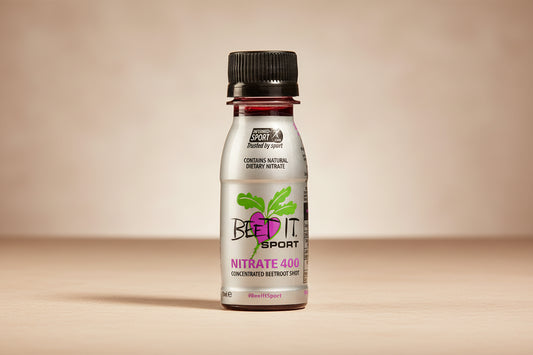 Bottle of Beet It Sport Nitrate 400 concentrated beetroot shot on a white background