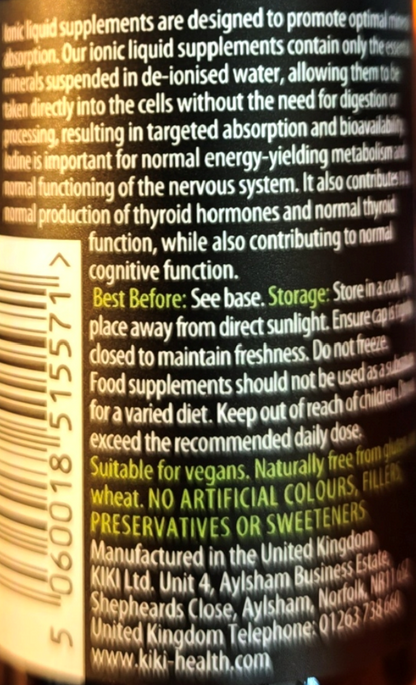 Close-up of a supplement bottle label showing product information, including a barcode on the left, English text, and Kiki Health branding and website.